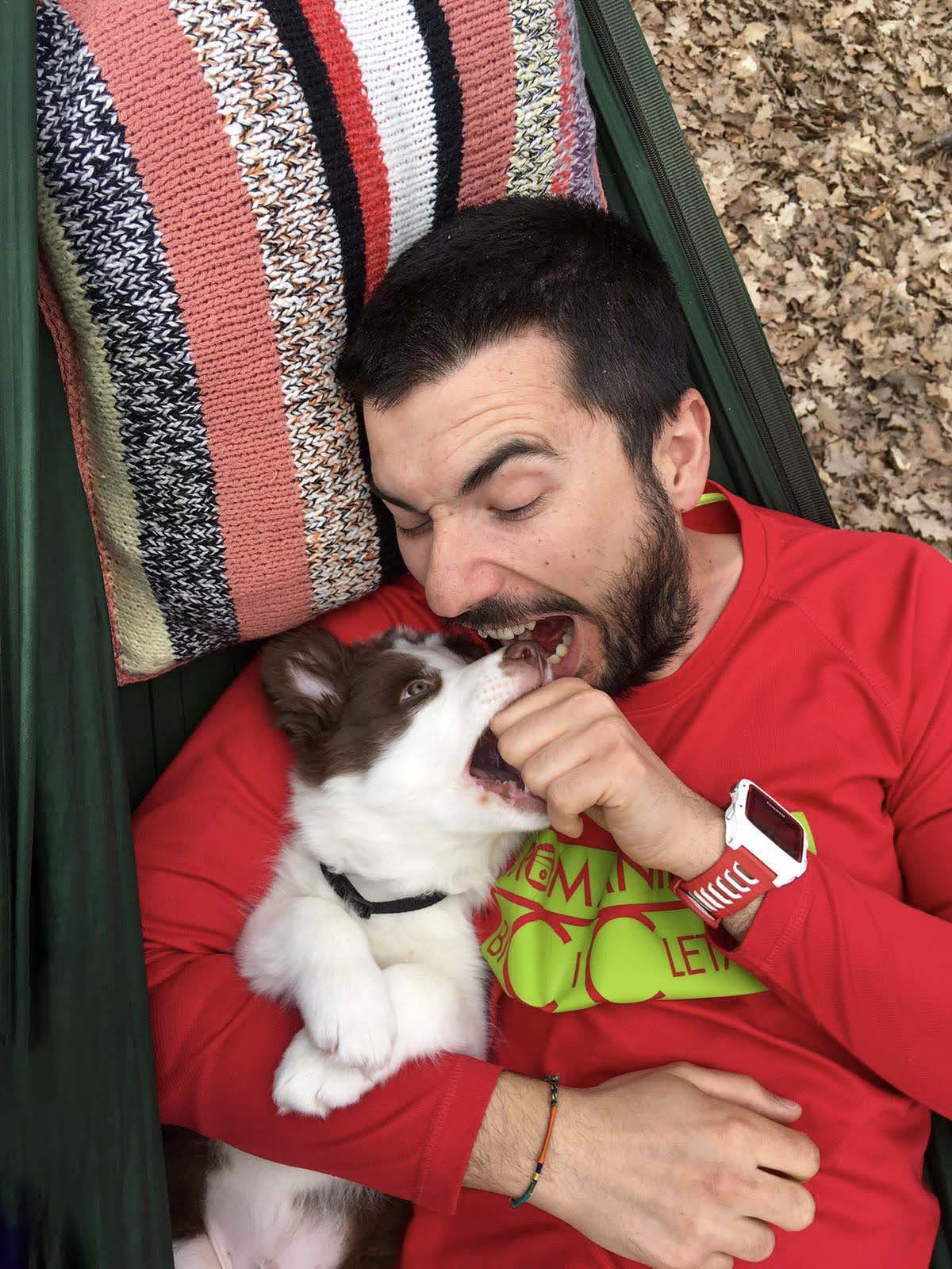 Playing and kinda biting my dad